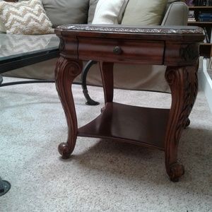 Antique end table. Solid wood finished